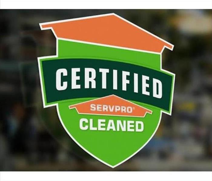 Certified: SERVPRO Cleaned sticker on business window.
